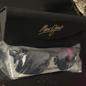 Maui Jim Black Sunglasses with Gold Logo. Includes case/instructions. Brand new.